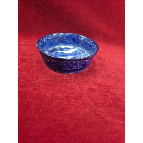 131 - A Victorian flow blue 'Jenny Lind' dish in an oak and E.P.N.S. swing handled table coaster/holder.
T... 