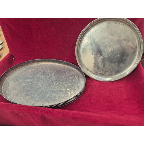 133 - Vintage silver plated oval serving tray, with foliate chased engraving and pierced gallery. 45cm x 3... 