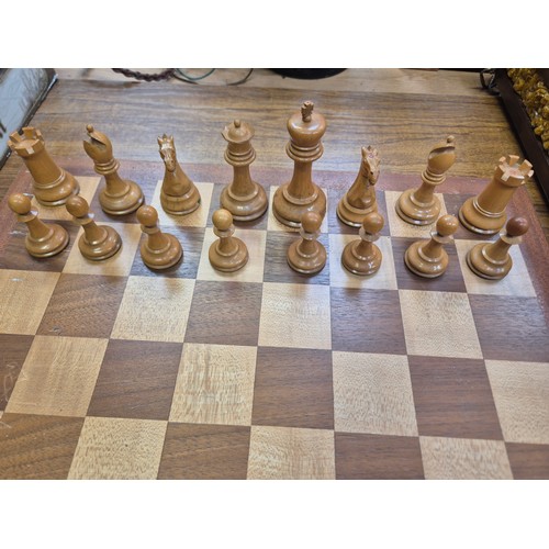 136 - Vintage Staunton Chessmen boxwood chess set, in the original wooden box with remnants of label insid... 