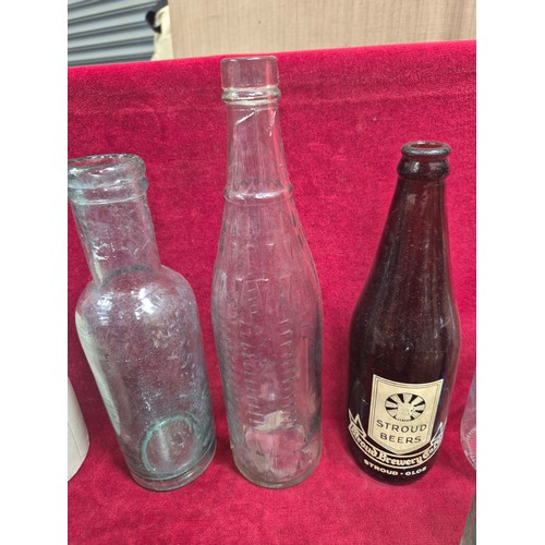 151 - Group of Victorian and early 20thC glass bottles and stoneware preserve pots, including ribbed poiso... 