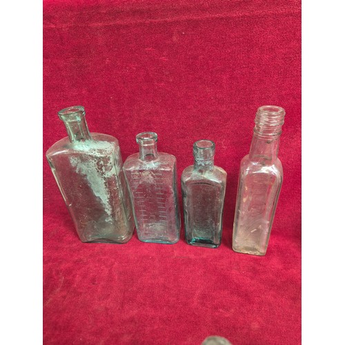 151 - Group of Victorian and early 20thC glass bottles and stoneware preserve pots, including ribbed poiso... 