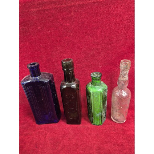 151 - Group of Victorian and early 20thC glass bottles and stoneware preserve pots, including ribbed poiso... 