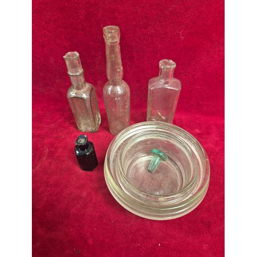 151 - Group of Victorian and early 20thC glass bottles and stoneware preserve pots, including ribbed poiso... 