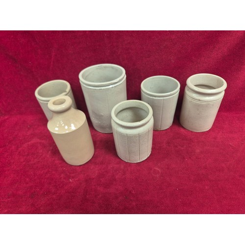 151 - Group of Victorian and early 20thC glass bottles and stoneware preserve pots, including ribbed poiso... 