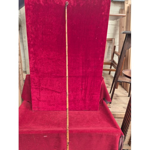 156 - Vintage bamboo cane fishing rod, complete with a wooden reel.