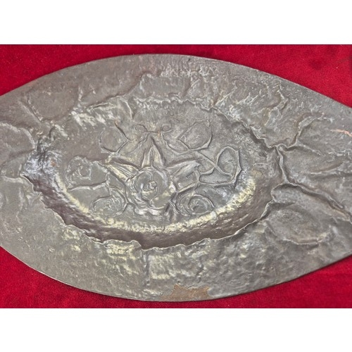 134 - Arts & Crafts pewter dressing table tray and matching hand mirror with embossed floral decoration.