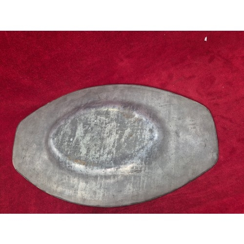 134 - Arts & Crafts pewter dressing table tray and matching hand mirror with embossed floral decoration.