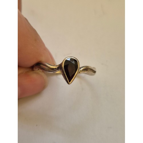 74 - 3 vintage silver rings with 925 marks, one with lilac coloured stone and a fourth ring in white meta... 