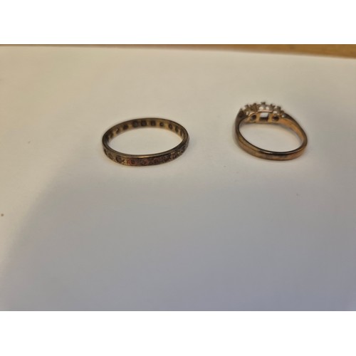 75 - Scrap gold inc 9ct ring missing stones Birm hallmarks 2.3 grams and an eternity ring with clear ston... 