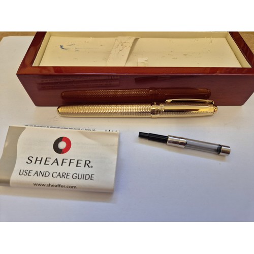 77 - A Sheaffer USA gold plated fountain pen from the Prelude Signature Collection with original box, ins... 
