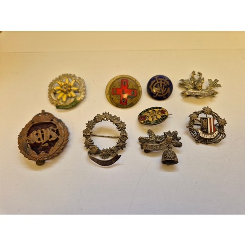81 - Small collection of vintage badges including The Queens Bays cap badge, Austrian souvenir badges, pr... 