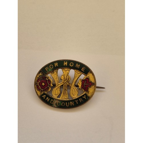 81 - Small collection of vintage badges including The Queens Bays cap badge, Austrian souvenir badges, pr... 