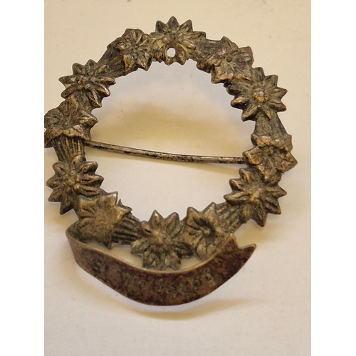 81 - Small collection of vintage badges including The Queens Bays cap badge, Austrian souvenir badges, pr... 