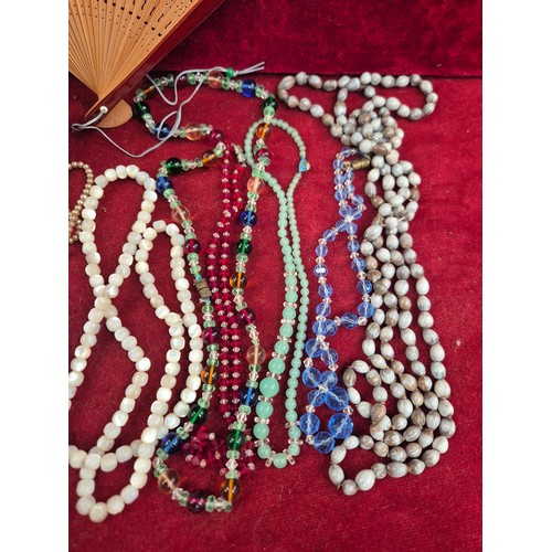 87 - 1930s Japanese lacquered jewellery box with contents of costume jewellery, 2 porcelain pincushion do... 