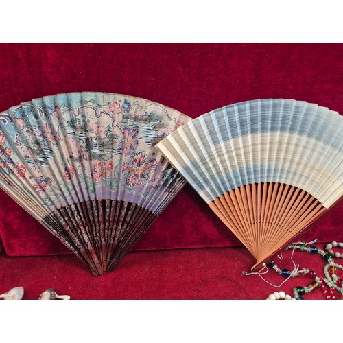 87 - 1930s Japanese lacquered jewellery box with contents of costume jewellery, 2 porcelain pincushion do... 