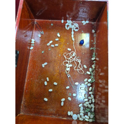 87 - 1930s Japanese lacquered jewellery box with contents of costume jewellery, 2 porcelain pincushion do... 