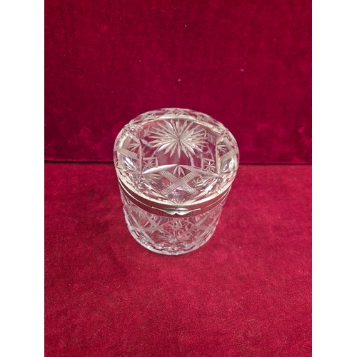 88 - A large John Grinsell & Sons cut crystal glass jar with sterling silver collars around the rims. Hal... 