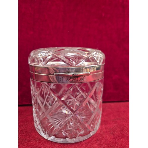 88 - A large John Grinsell & Sons cut crystal glass jar with sterling silver collars around the rims. Hal... 
