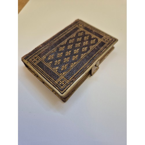 94E - A small Victorian pocket Book of Common Prayer and administration of the Sacraments. A nice tooled l... 