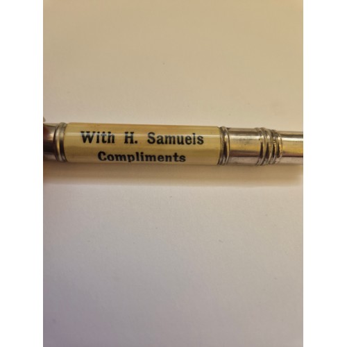 94B - Small advertising pocket button hook. White metal tube with screw action hook stored inside, the cel... 