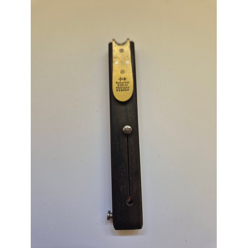 94A - 19thC ebony and brass Quill cutter in the original box, made by Rodgers Cutlers (to her Majesty) wit... 