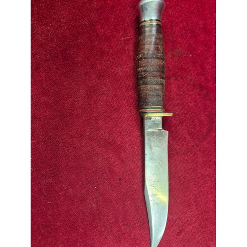 95 - A vintage Bowie Hunting Knife by A Wright & Son Sheffield with leather sheath. Blade 12.5 inches