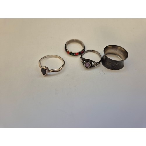 74 - 3 vintage silver rings with 925 marks, one with lilac coloured stone and a fourth ring in white meta... 