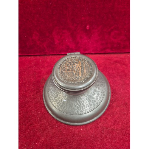 99 - An unusual early 20th Century Pewter Inkwell, the lid set with a brass plaque of St Bartholomew with... 