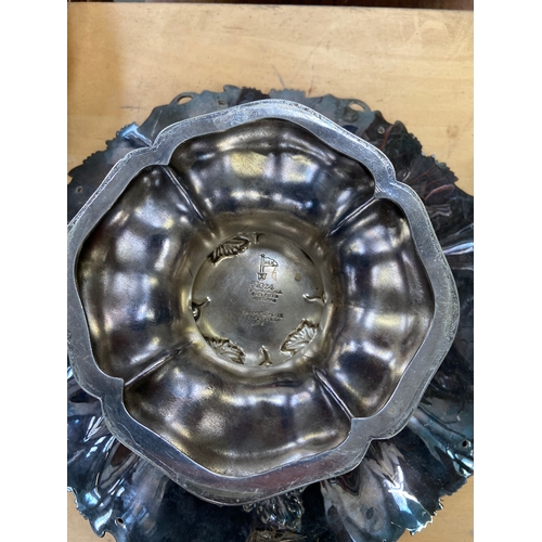 158A - Lot of silver plated items, including Walker & Hall fruit basket, wine coaster, gravy boat, creamer,... 