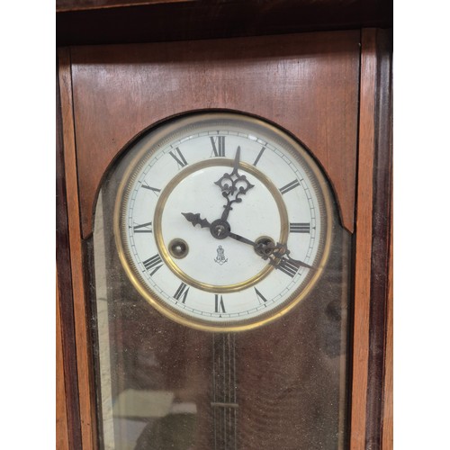 106 - German Vienna style wall clock, with walnut case, prancing horse pediment, porcelain dial and R.A. r... 