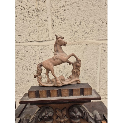 106 - German Vienna style wall clock, with walnut case, prancing horse pediment, porcelain dial and R.A. r... 