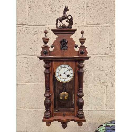 107 - German Junghans Vienna style wall clock, with pine case, mahogany veneer, prancing horse pediment, p... 