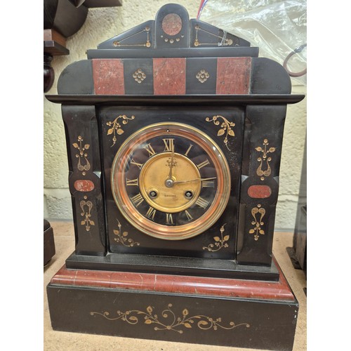 109 - Victorian black slate and marble mantel clock, with gilded engraved floral details, brass bezel and ... 