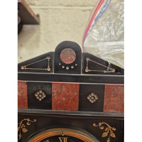 109 - Victorian black slate and marble mantel clock, with gilded engraved floral details, brass bezel and ... 