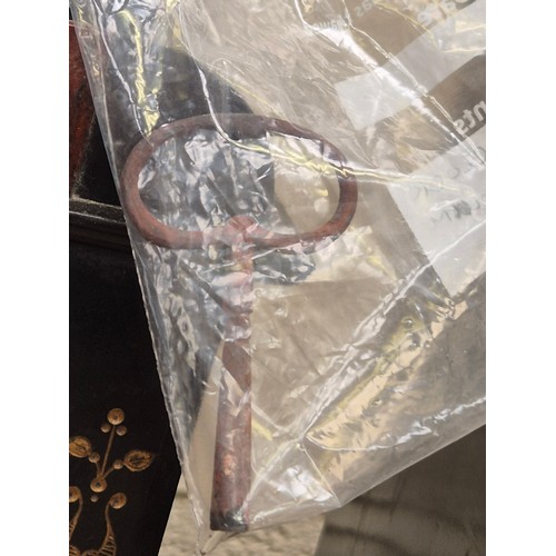 109 - Victorian black slate and marble mantel clock, with gilded engraved floral details, brass bezel and ... 