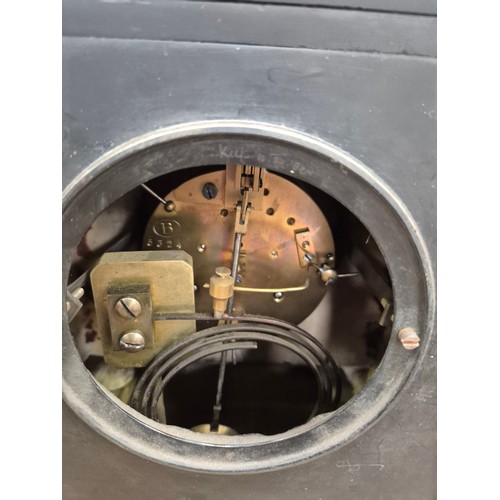 109 - Victorian black slate and marble mantel clock, with gilded engraved floral details, brass bezel and ... 