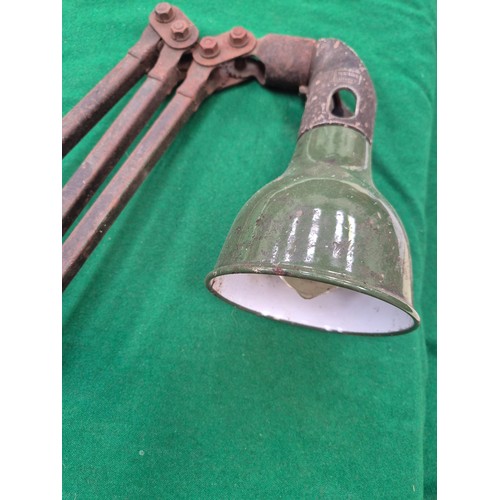 111 - Early 20thC Mek Elek Engineering articulated machinist lamp. With green enamelled shade and rocker s... 