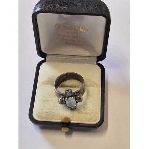 73 - An unusual Art Deco ring 800 silver,set with square cut fluorite with silks and four topaz stones. S... 