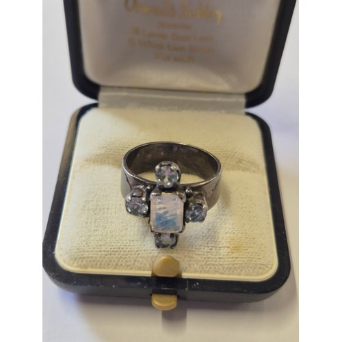 73 - An unusual Art Deco ring 800 silver,set with square cut fluorite with silks and four topaz stones. S... 