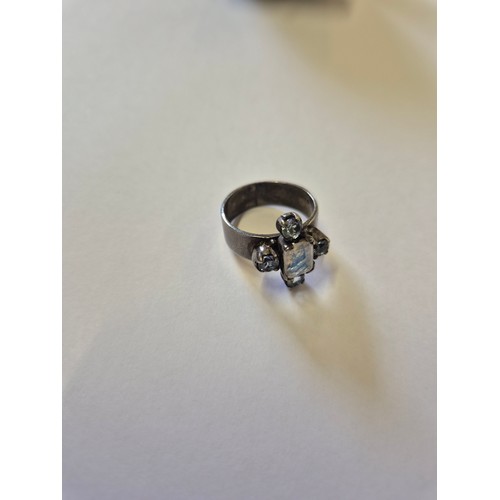 73 - An unusual Art Deco ring 800 silver,set with square cut fluorite with silks and four topaz stones. S... 
