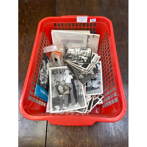 51 - An interesting collection of vintage black and white photographs and slides.