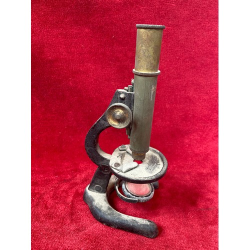 57 - Small antique 'Octopus' series brass and cast metal microscope (needs attention).