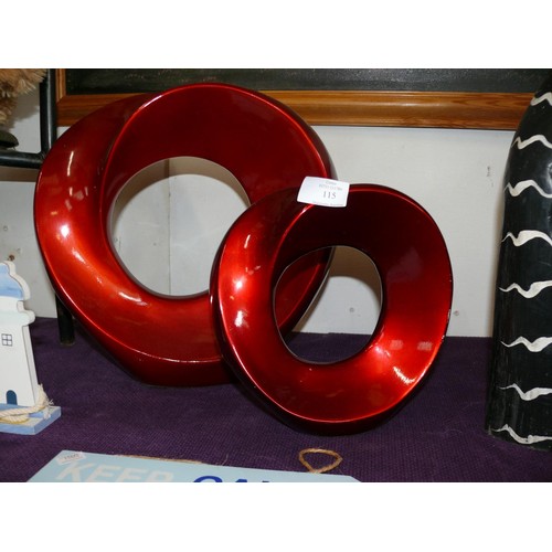 115 - 2 CONTEMPORARY RED CIRCULAR SCULPTURES
