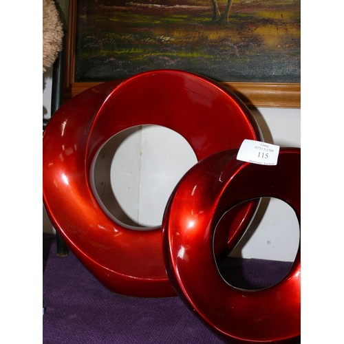 115 - 2 CONTEMPORARY RED CIRCULAR SCULPTURES
