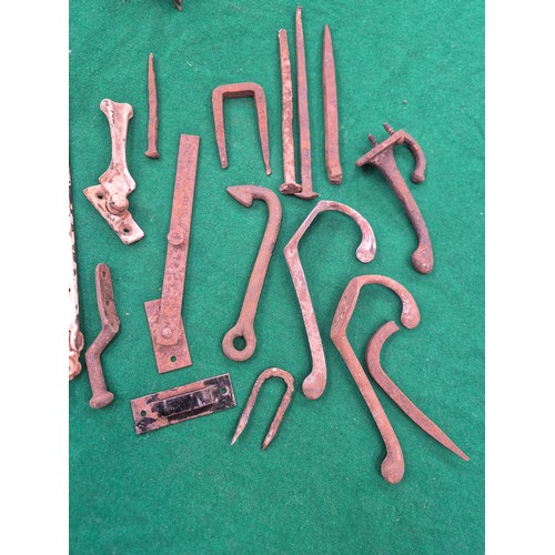 221 - Lot of wrought and cast iron hardware, including door latches, sash window stays, hooks etc.