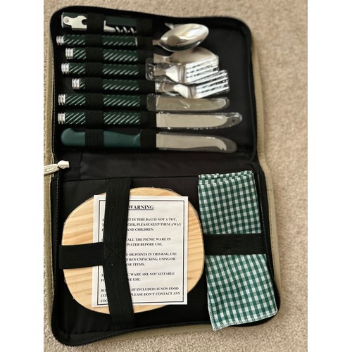 114A - A NATIONAL TRUST PICNIC SET FOR 2 WITH CHEESE BOARD, A SANDWICH COOL BAG, A TIN “MY GARDEN THINGS” A... 