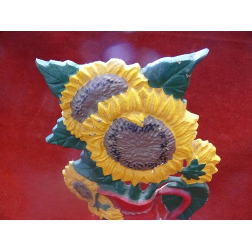 61 - Cast iron sunflower doorstop