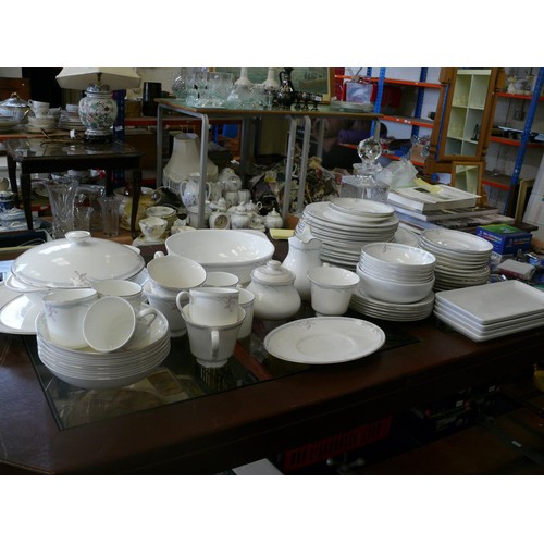 166 - A very large dinner service by Royal Doulton in the 'Carnation' pattern to include dinner plates, sa... 