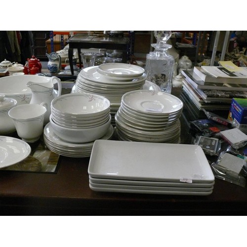 166 - A very large dinner service by Royal Doulton in the 'Carnation' pattern to include dinner plates, sa... 