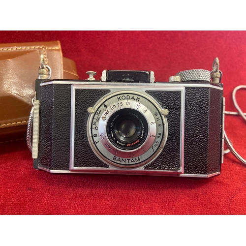 49 - Kodak Bantam Folding Camera with 47mm f4.5 Anastigmat Special lens. Complete with original brown lea... 